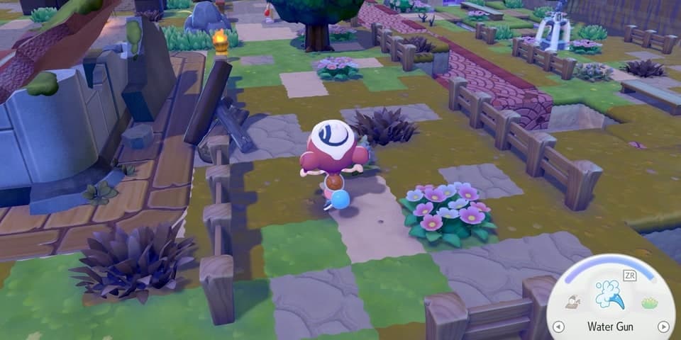 Pokemon Pokopia watering the ground and plants